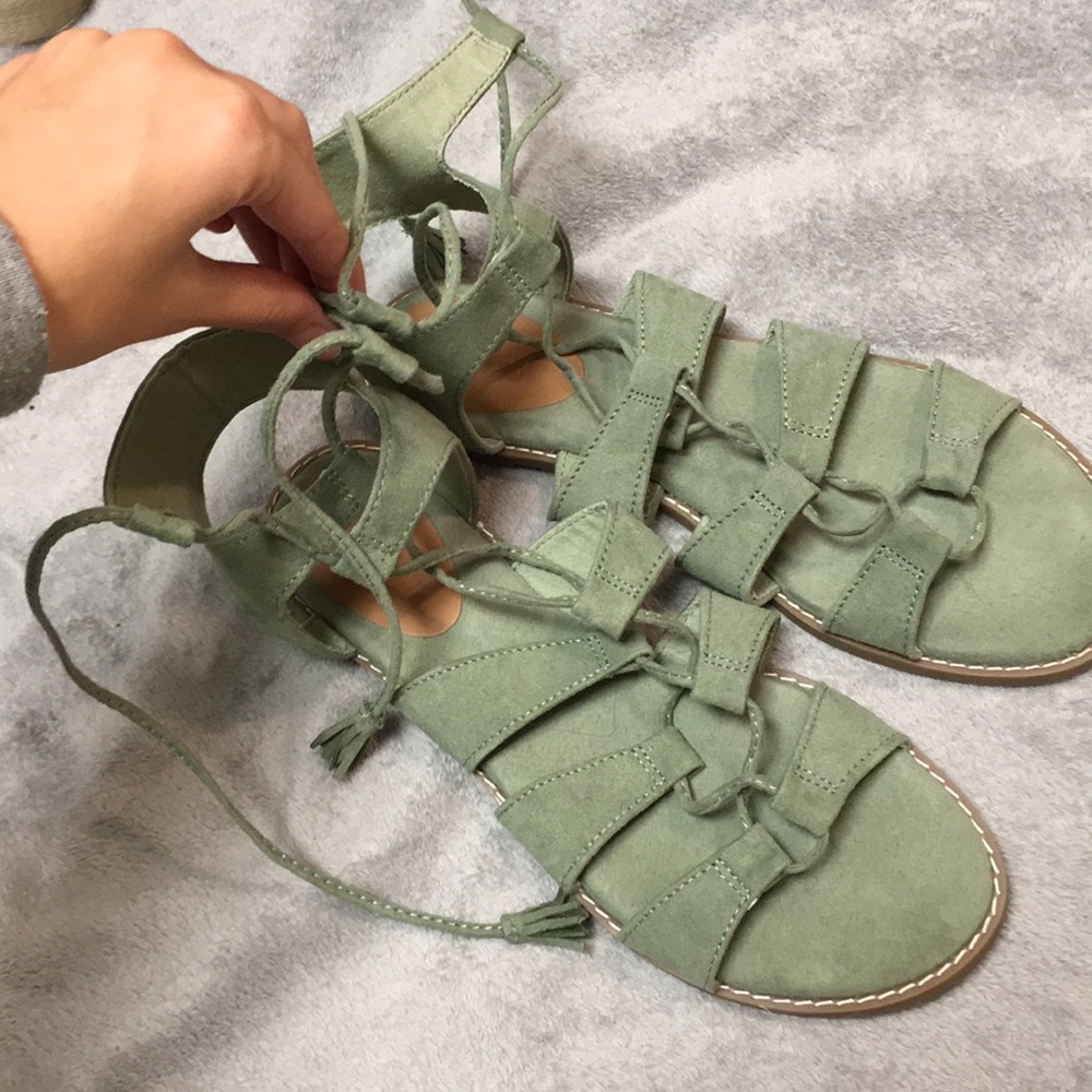 Laced up green sandals